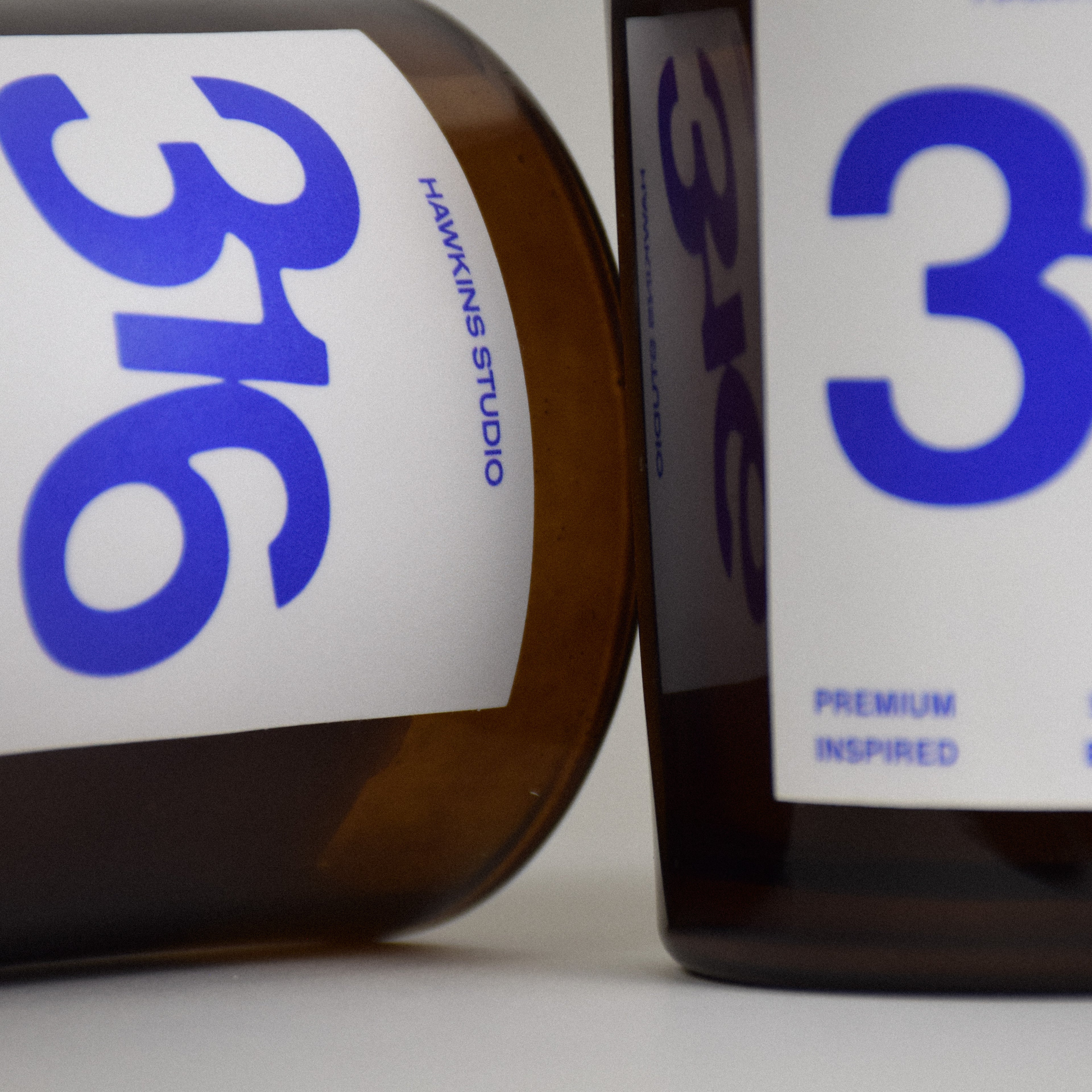 Two candle vessels with '316' branding on a white background